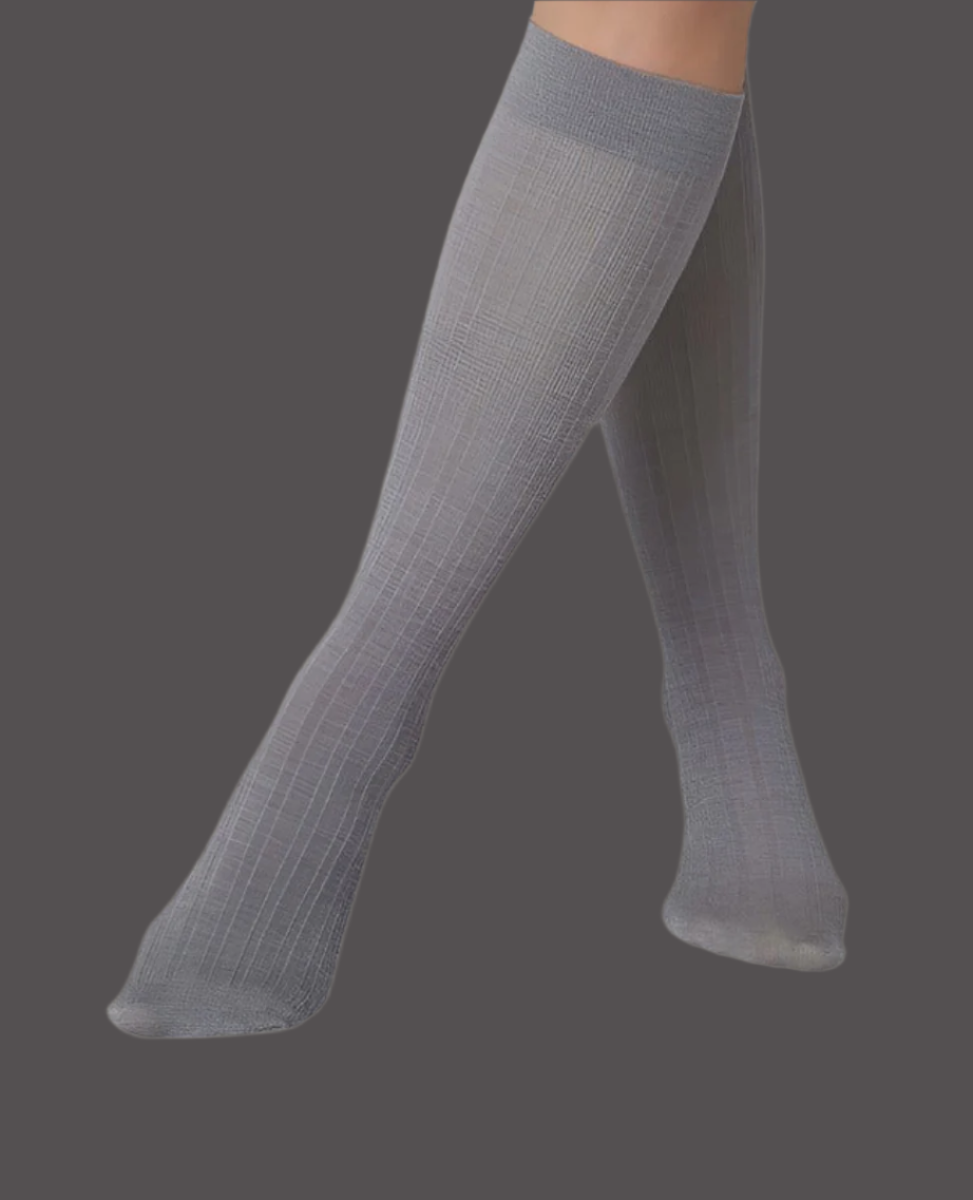 Knee-high socks in a muted gray color with a subtle ribbed texture, featuring a snug fit and a smooth, slightly sheer material.