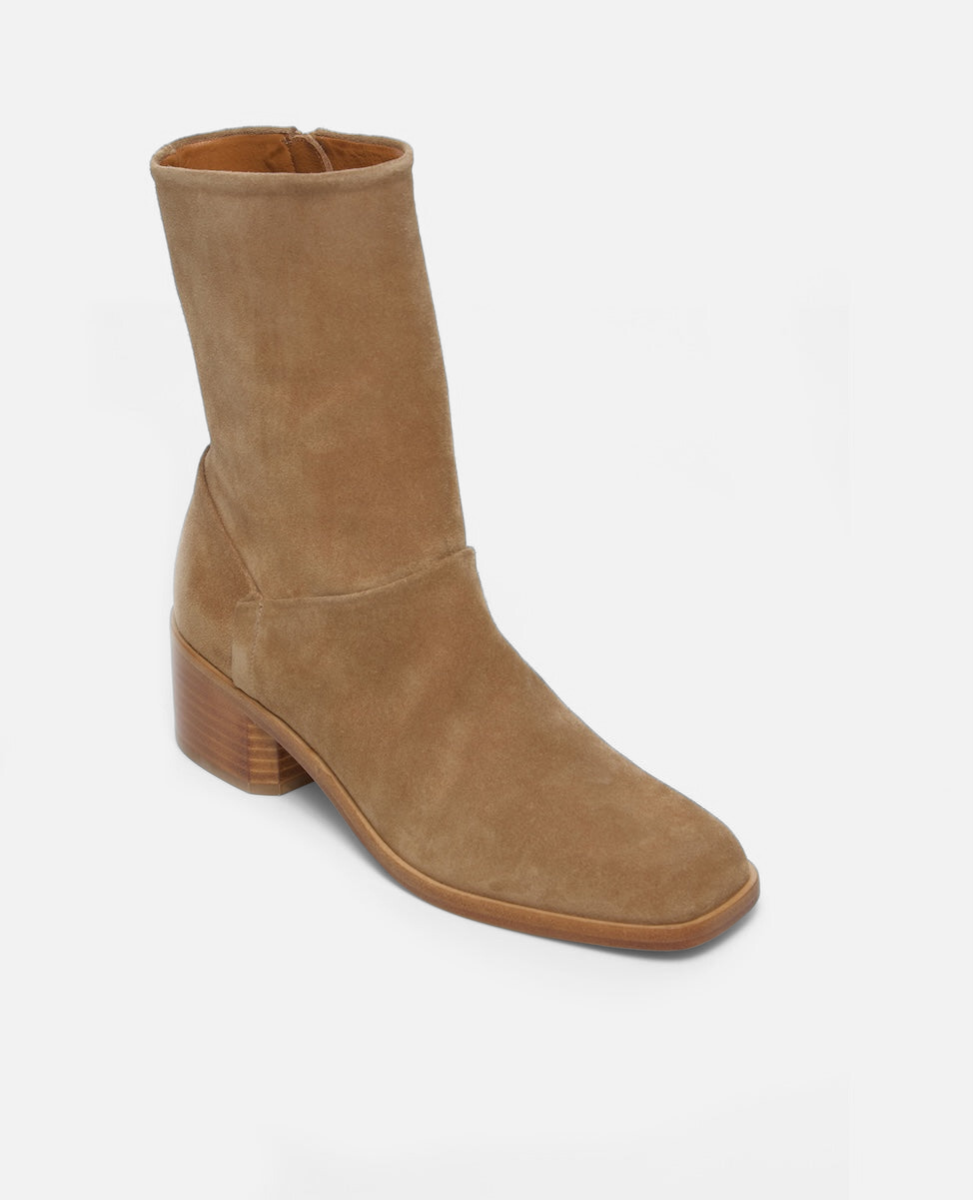 Tan ankle boot on a white background