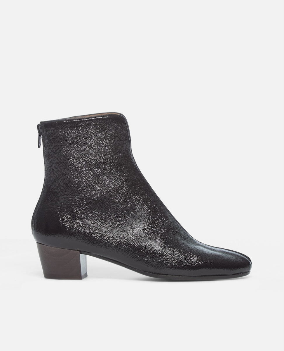 Black ankle boot on a white background