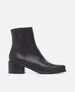 Black ankle boot on a white background 1