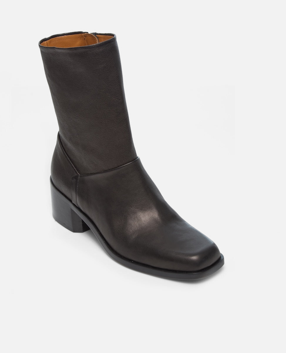 Black leather boot shown at an angle on a white background