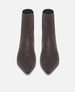 Pair of brown leather ankle boots on a white background 3