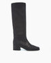 A tall, black leather boot with a smooth texture, a squared toe, a low block heel, and a sleek, minimalist design. 6