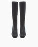 Tall, black leather boots with a smooth texture, squared toes, and a sleek, minimalist design. 8