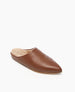 A brown, pointed-toe mule slipper with a smooth leather exterior and a soft, plush interior lining. 6