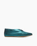 A sleek, teal leather flat shoe with a minimalist design, featuring a smooth texture, a slightly pointed toe, and a thin, light brown sole. 2