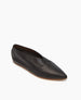 A sleek, black leather flat shoe with a pointed toe, smooth texture, and a minimalist design featuring a low-cut vamp and thin brown sole. 4