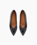 A pair of sleek, black leather pointed-toe flats with a smooth, glossy finish and tan insoles. 6