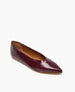 A sleek, maroon leather flat shoe with a pointed toe, smooth texture, and a low-profile design. 5