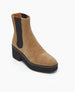 A tan suede ankle boot with a black elastic side panel, a black platform sole, and a rounded toe. 7