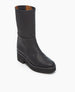 A black, mid-calf leather boot with a smooth texture, round toe, chunky heel, and a side zipper. 4