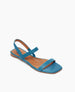 Angled view of the Fifi Sandal in Cerulean leather with barely there string like straps and a 10mm sandal.  3