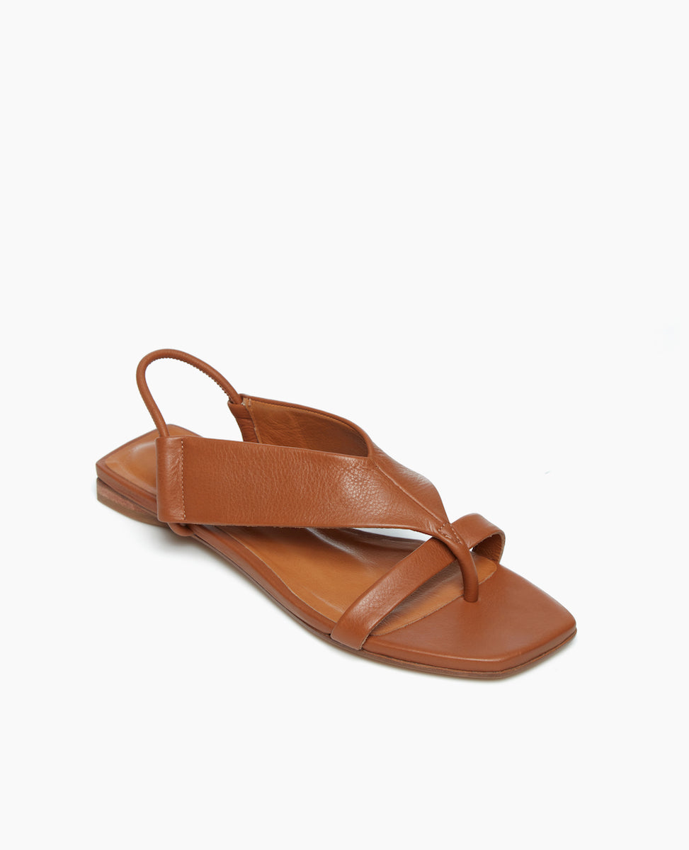 Angled view of the Finch Sandal in Cuoio, featuring a squared off toe and heel.