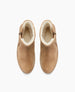 Tan suede ankle boots with a rounded toe, side zipper, and plush white fleece lining. 5