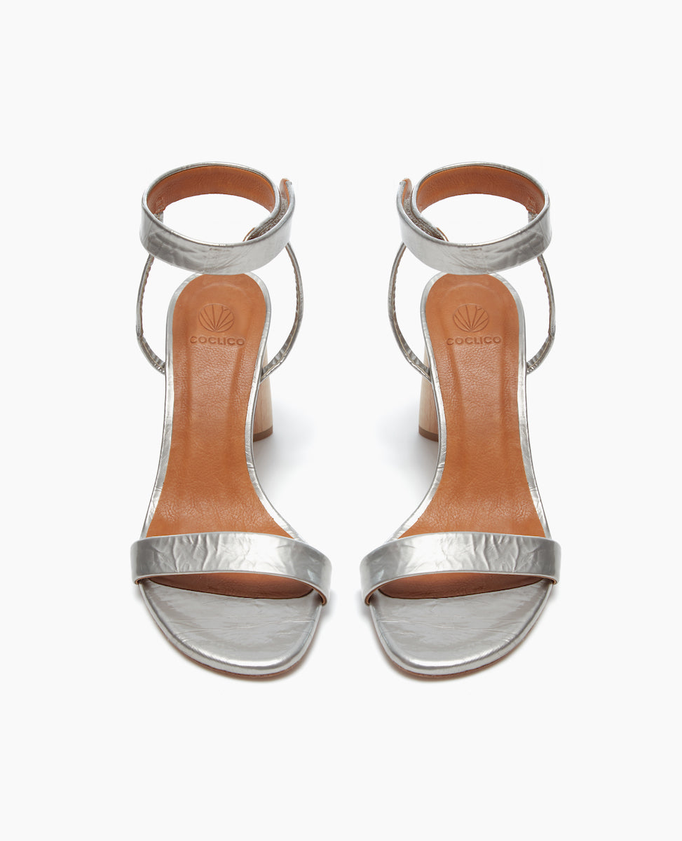 Front view of the Gina Heel in Chateau Grey with a straight, narrow front strap and ankle strap.