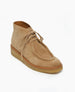 A tan split suede ankle boot with a softly sculpted toe, lace-up front, and a thick, light brown crepe sole. 7