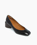 A black leather pump with a square toe, medium block heel, and tan interior lining. 8