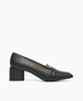 A sleek, black leather loafer with a pointed toe, featuring a low block heel and a smooth, polished finish. 4