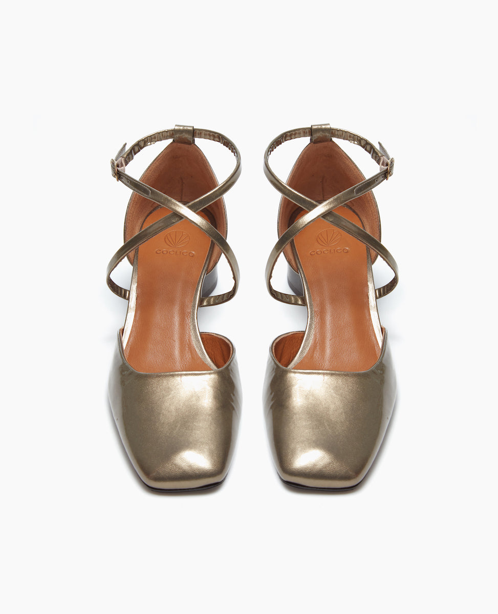 Front view of the Isabel Mary Jane in Starry Night patent leather: featuring criss-cross-straps with a sculptural mid-height heel and a squared-off, angular toe character.