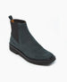 A sleek, deep sea split suede Chelsea boot with a black elastic side panel, a pull tab at the back, a squared toe, and a sturdy black rubber sole. 6