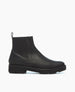 A sleek black ankle boot with a smooth leather texture, featuring a rounded toe, a low block heel, and a pull tab at the back for easy wear. 5