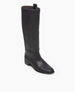 A single, sleek black leather knee-high boot with a low heel is displayed against a plain white background. 6