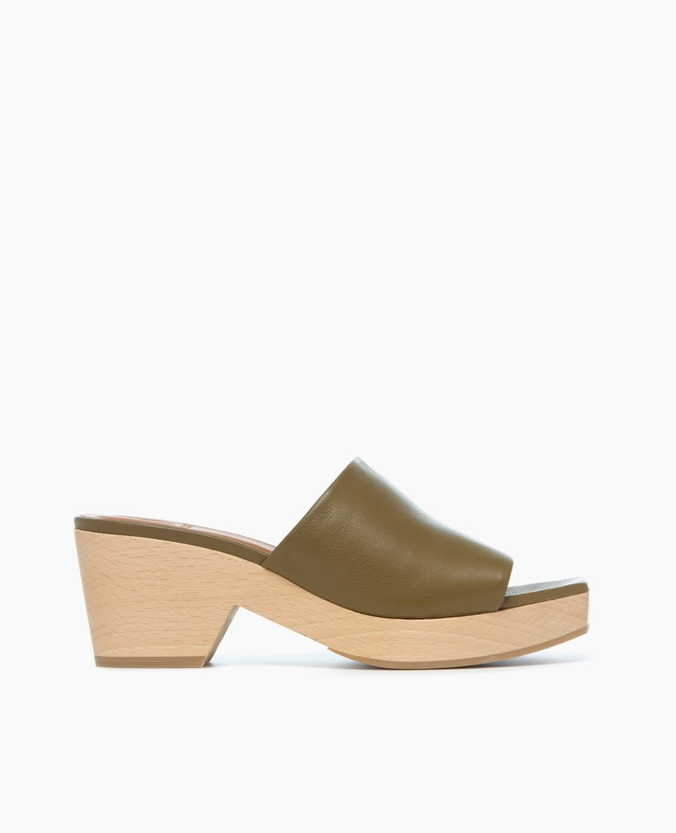 A stylish sandal featuring an olive green leather upper with a smooth texture, an open toe design, and a light wooden block heel and platform.