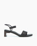 A sleek black sandal featuring a block heel, a wide front strap, and a thin ankle strap with a minimalist design. 2