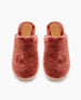 Plush, rust-colored slippers with a soft, fuzzy texture, featuring a closed-toe design, a tan leather insole, and a flat sole. 8