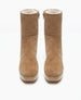 Tan suede ankle boots with a smooth, matte finish, featuring a rounded toe, a wooden platform sole, a side zipper, and a plush, white fur lining. 5