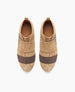 Tan suede slip-on shoes with wide brown elastic bands across the top, featuring a rounded toe, white rubber soles, and a pull tab at the heel. 4