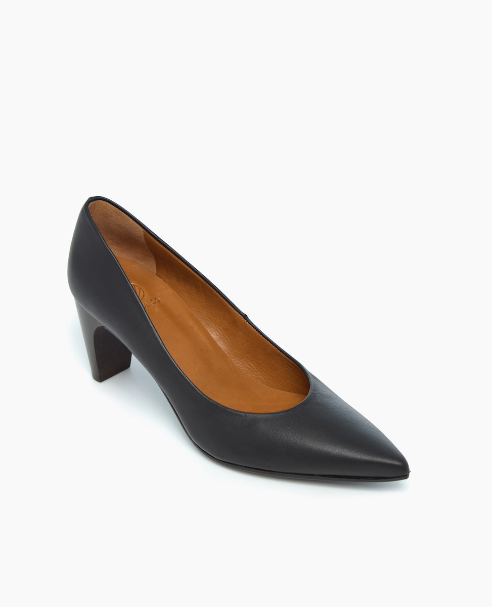 A sleek, black leather pump with a pointed toe, a low block heel, and a tan interior lining.