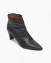 A sleek, black leather ankle boot with a pointed toe, a side zipper, a smooth texture, and a medium-height block heel. 8