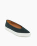 A dark green, suede-textured slip-on shoe with a white rubber sole, featuring a rounded toe and a low-cut design. 3