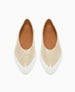 A pair of sleek, pointed-toe flats with a metallic gold upper, white rubber sole, and tan interior lining, featuring a minimalist design and smooth texture. 4