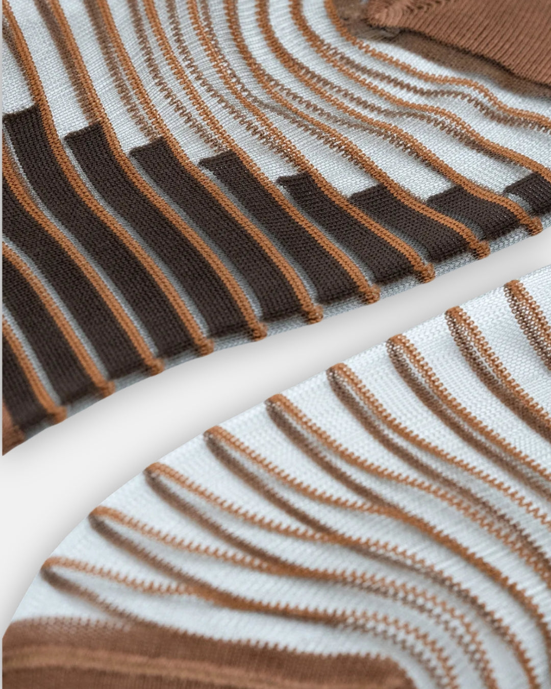 Pair of sheer Shibuya Moka socks with curving brown and caramel stripes, laid flat on a light gray background