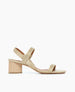 The Sterling wood heeled, strappy sandal in champagne metallic suede, side view 1