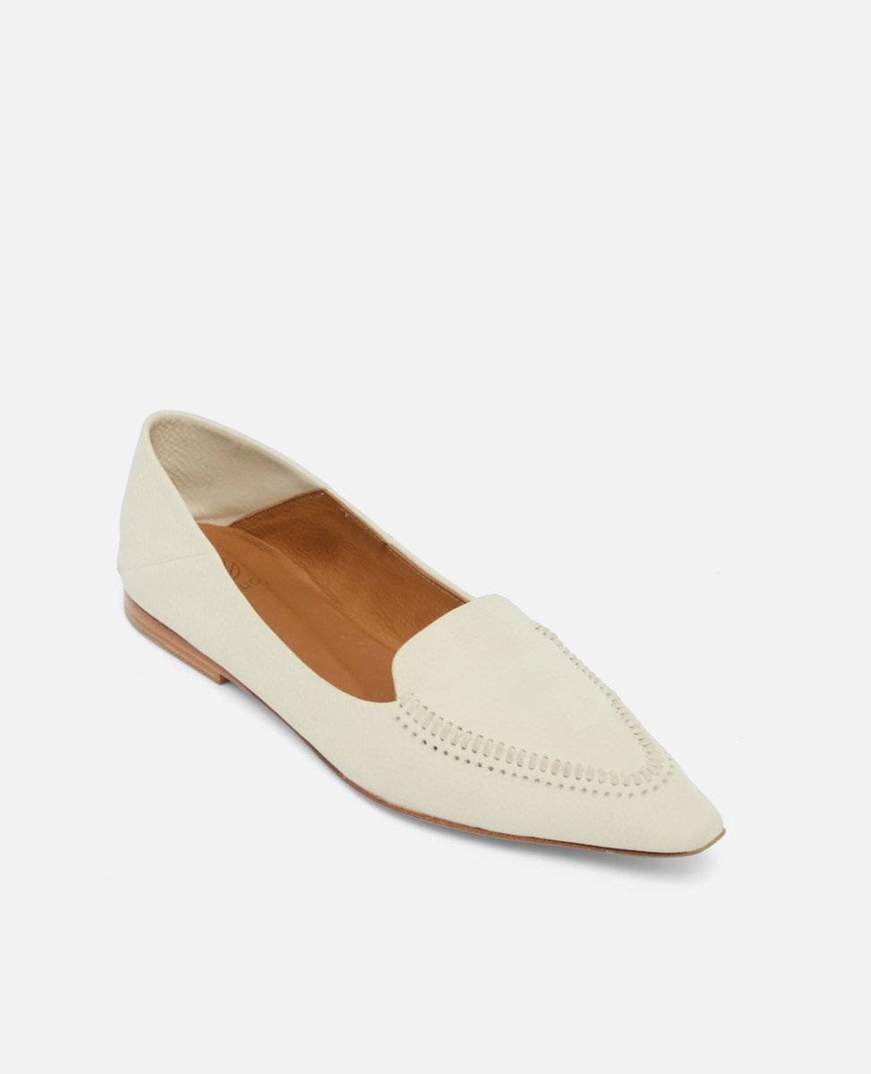 Angled view of a pointed-toe white nubuck leather loafer with topstitch detailing and a flat leather sole on a white background