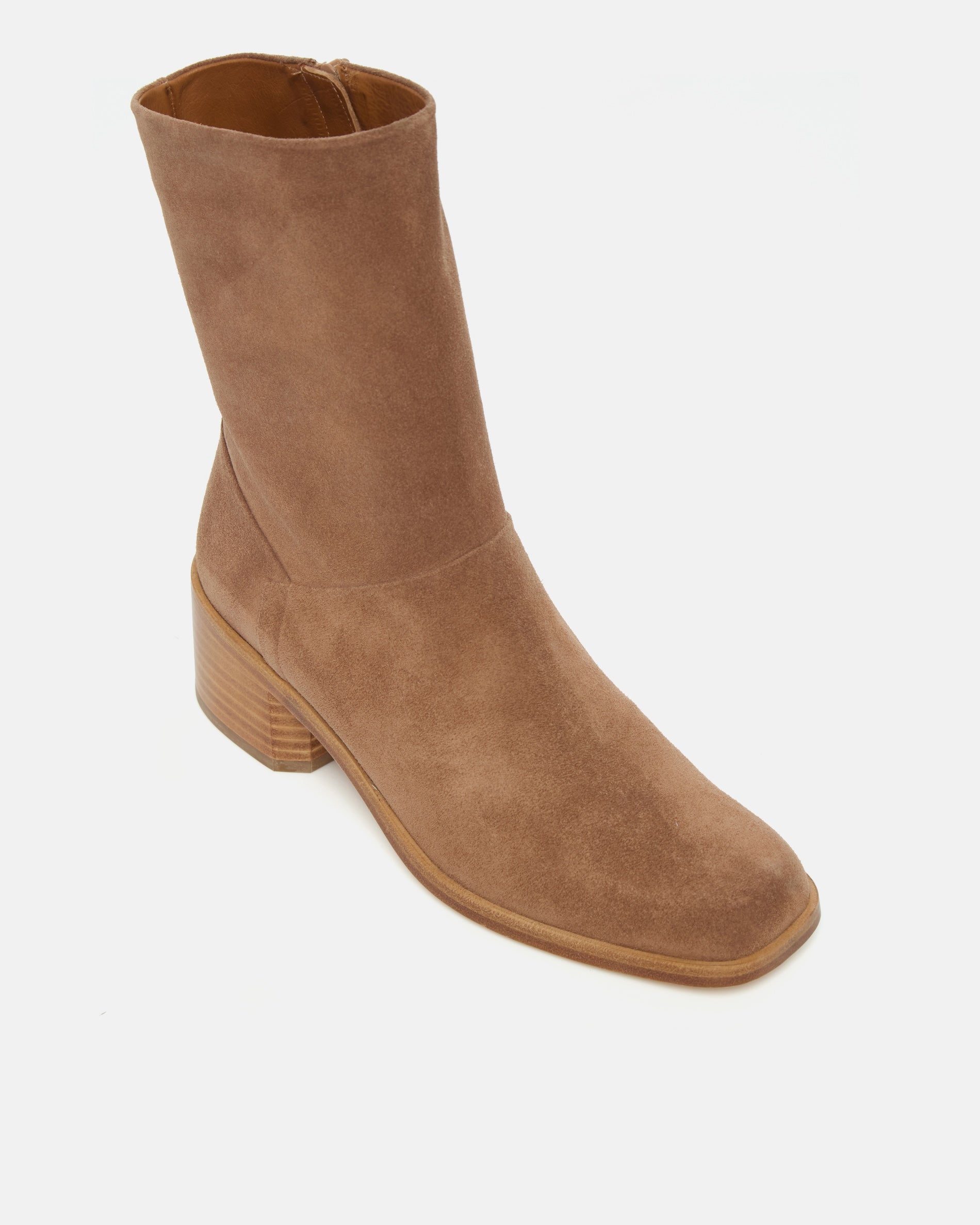 Brown suede ankle boot on a white background