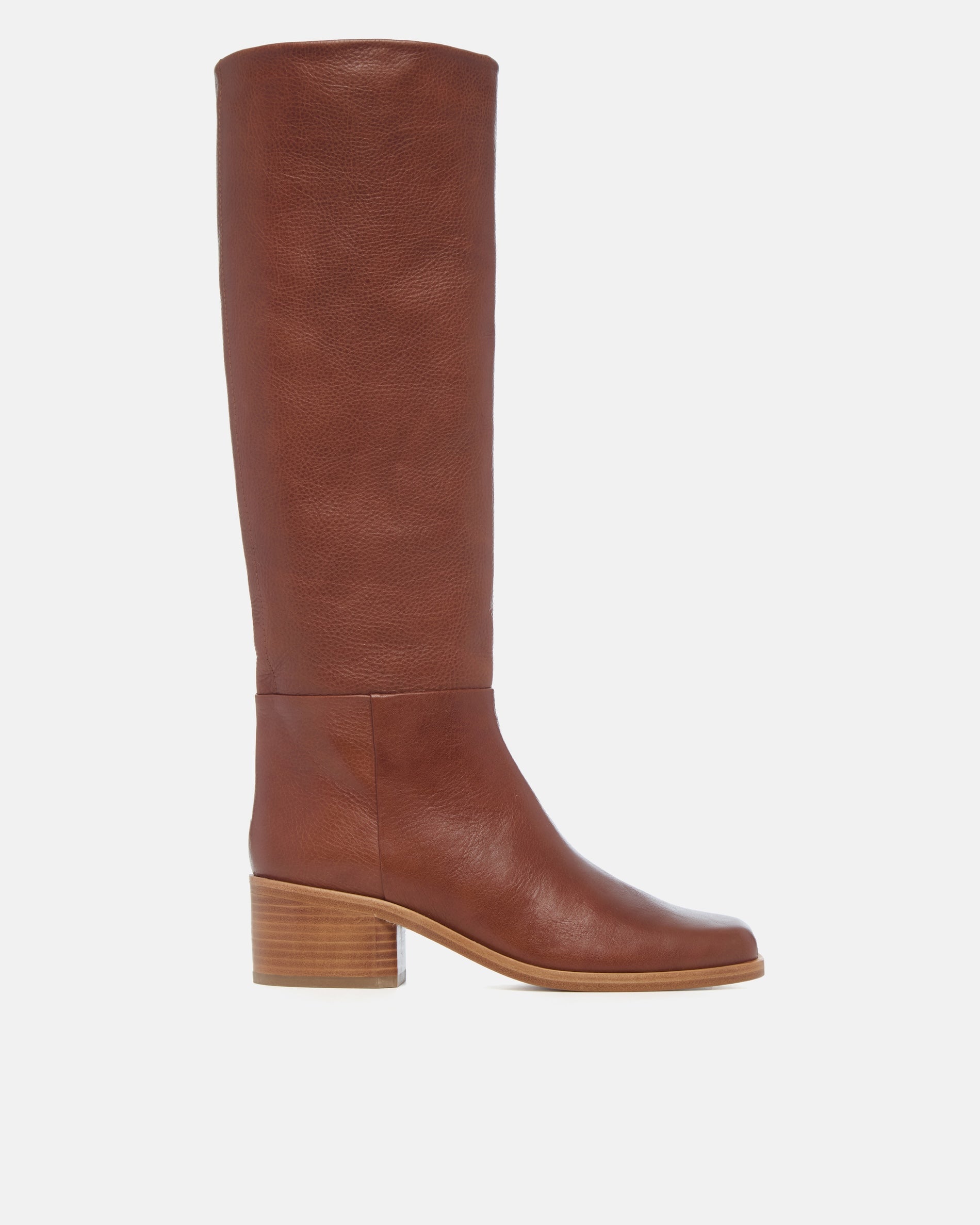 Coclico Alto Boot in Cuero, side view of a tan leather knee high boot with natural stacked block heel