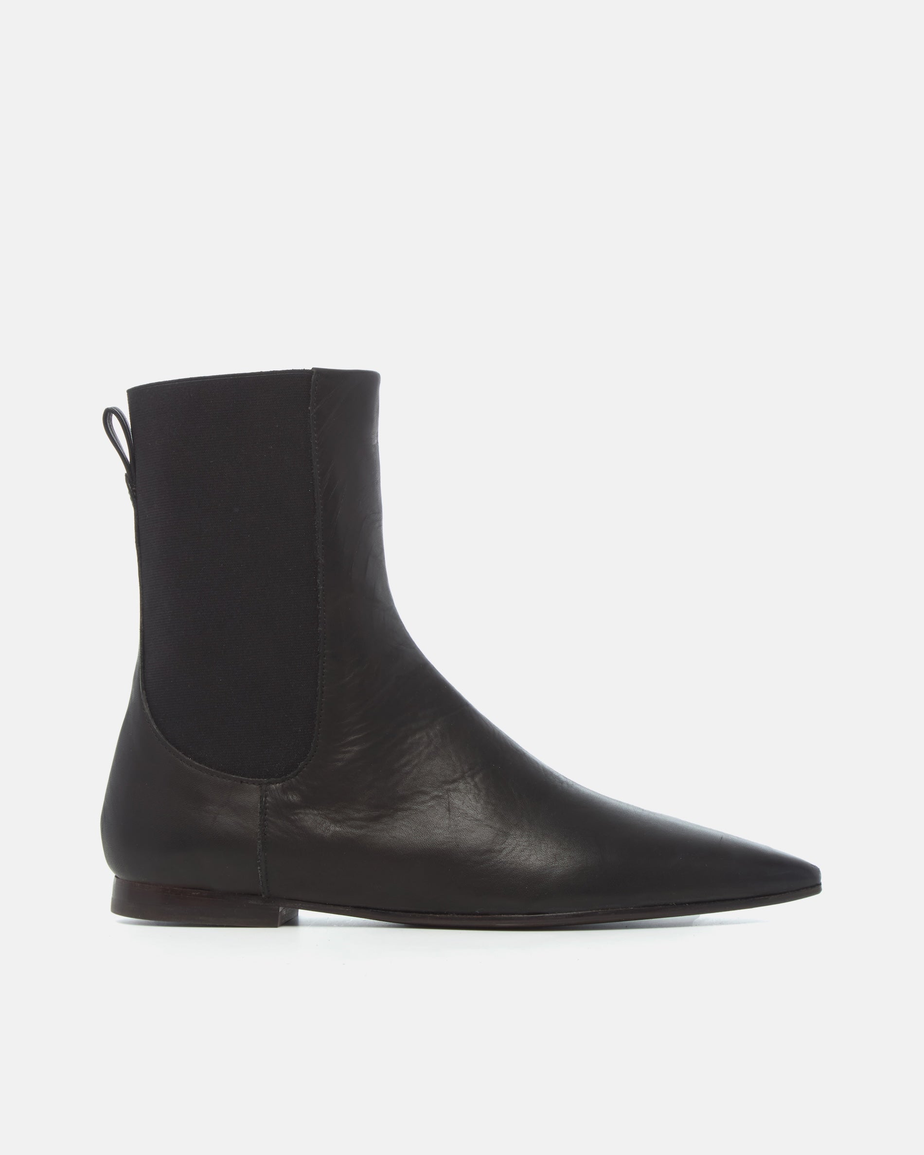 Coclico Cad Boot in black leather, side view of a pointed toe Chelsea ankle boot