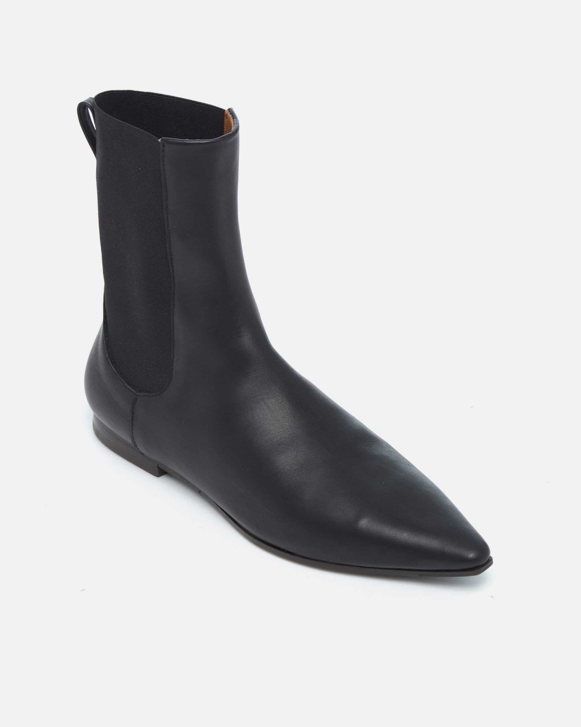 Coclico Cad Boot in black leather, angled view of the elastic side gore and pointed toe