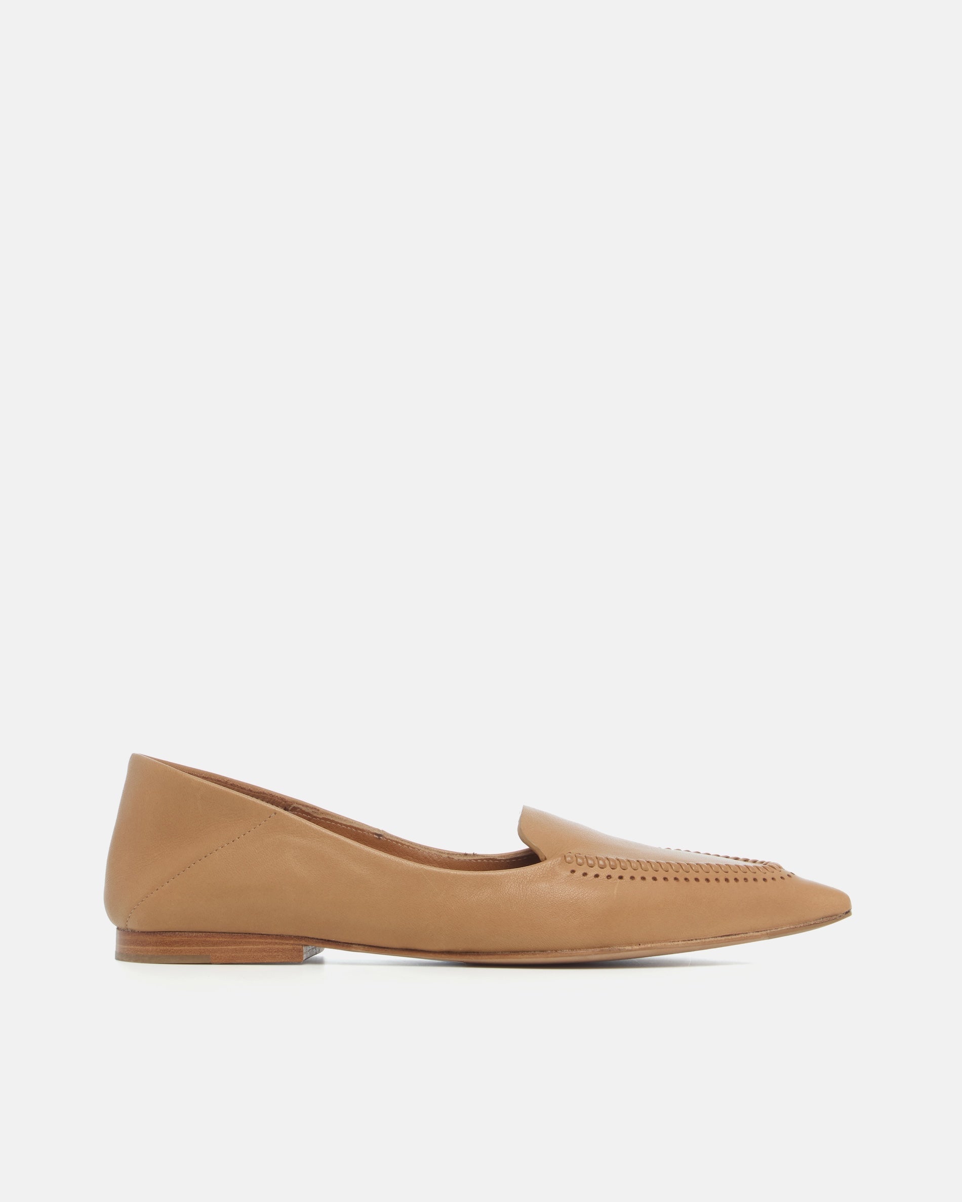 Side view of a pointed-toe camel leather loafer with topstitch detailing and a flat leather sole on a white background