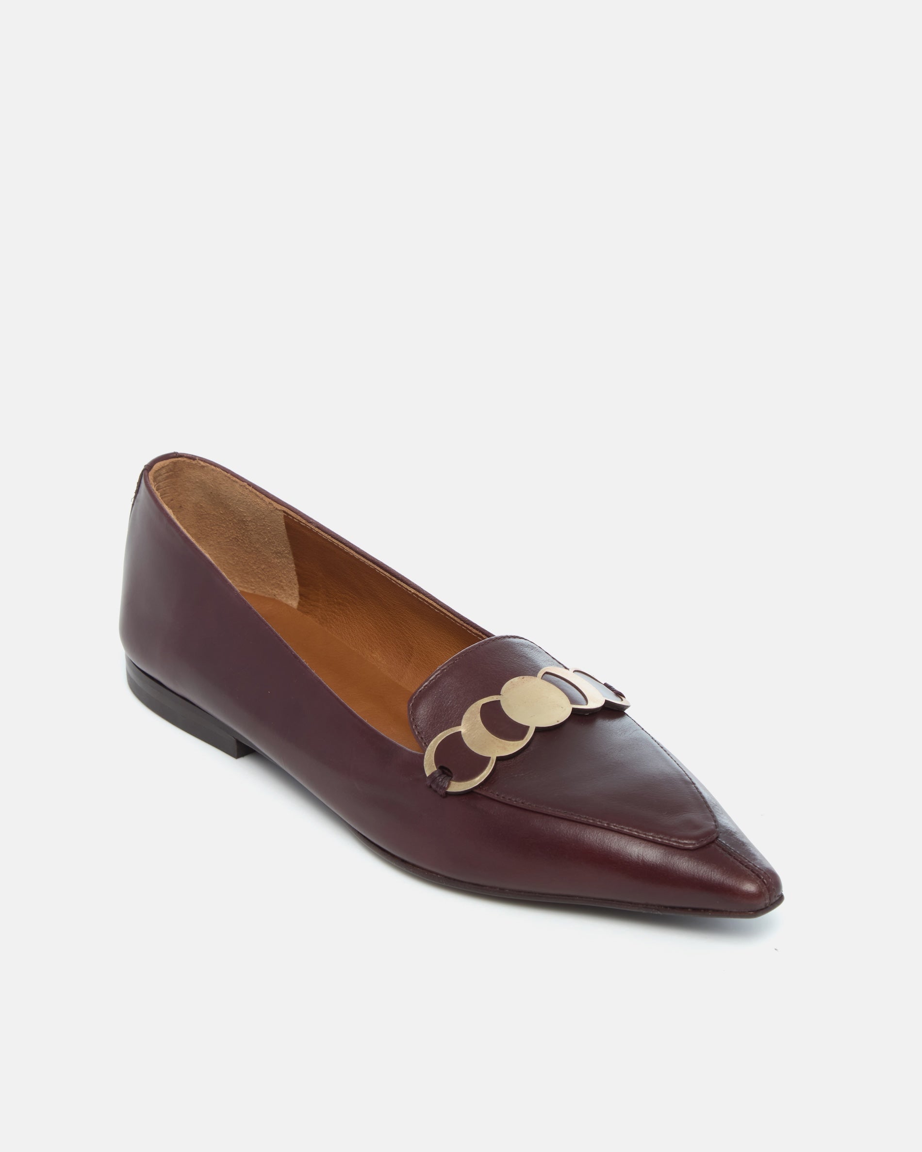 Coclico Curie Loafer in Oxblood leather, angled view of the pointed toe and gold coin trim