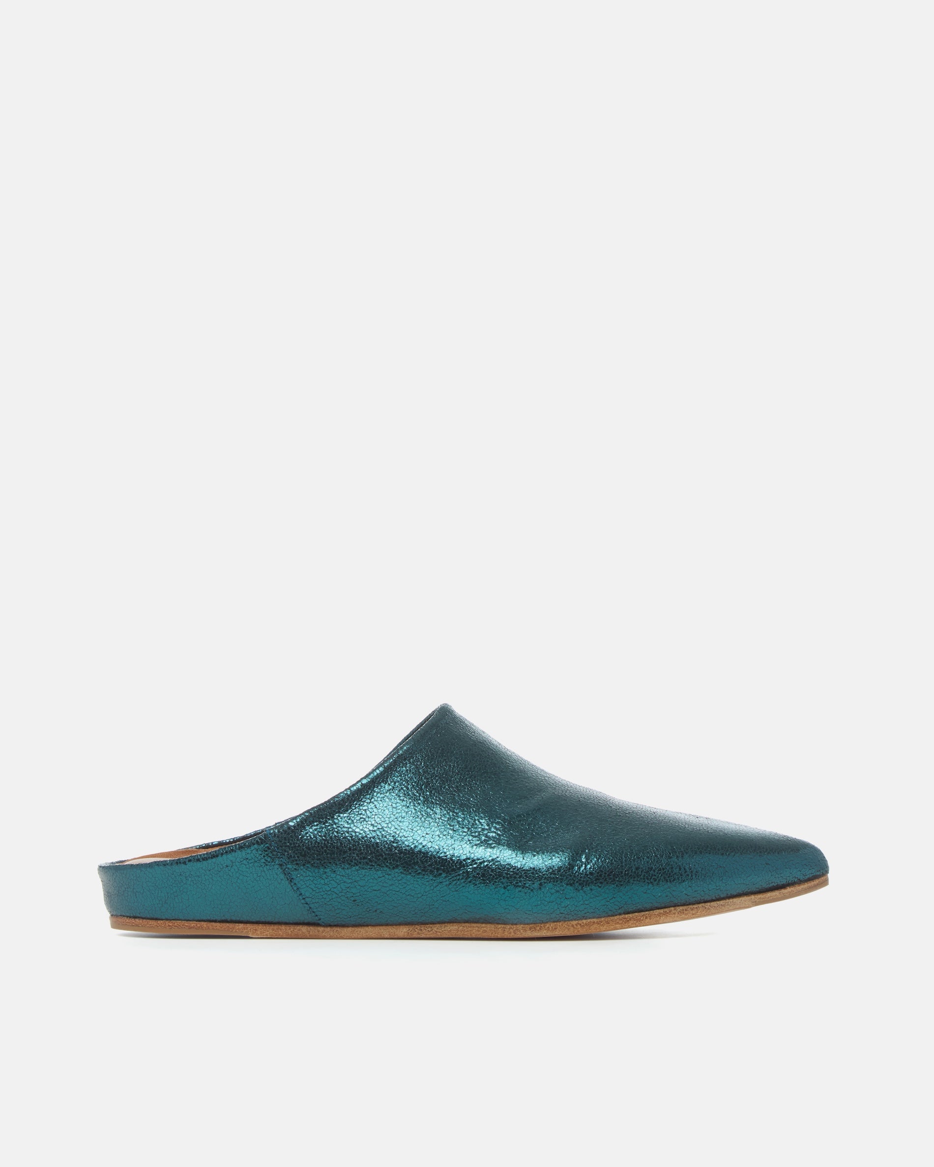 Side view of a blue metallic pointed-toe leather mule with a slight built-in wedge and clean minimalist silhouette on a white background