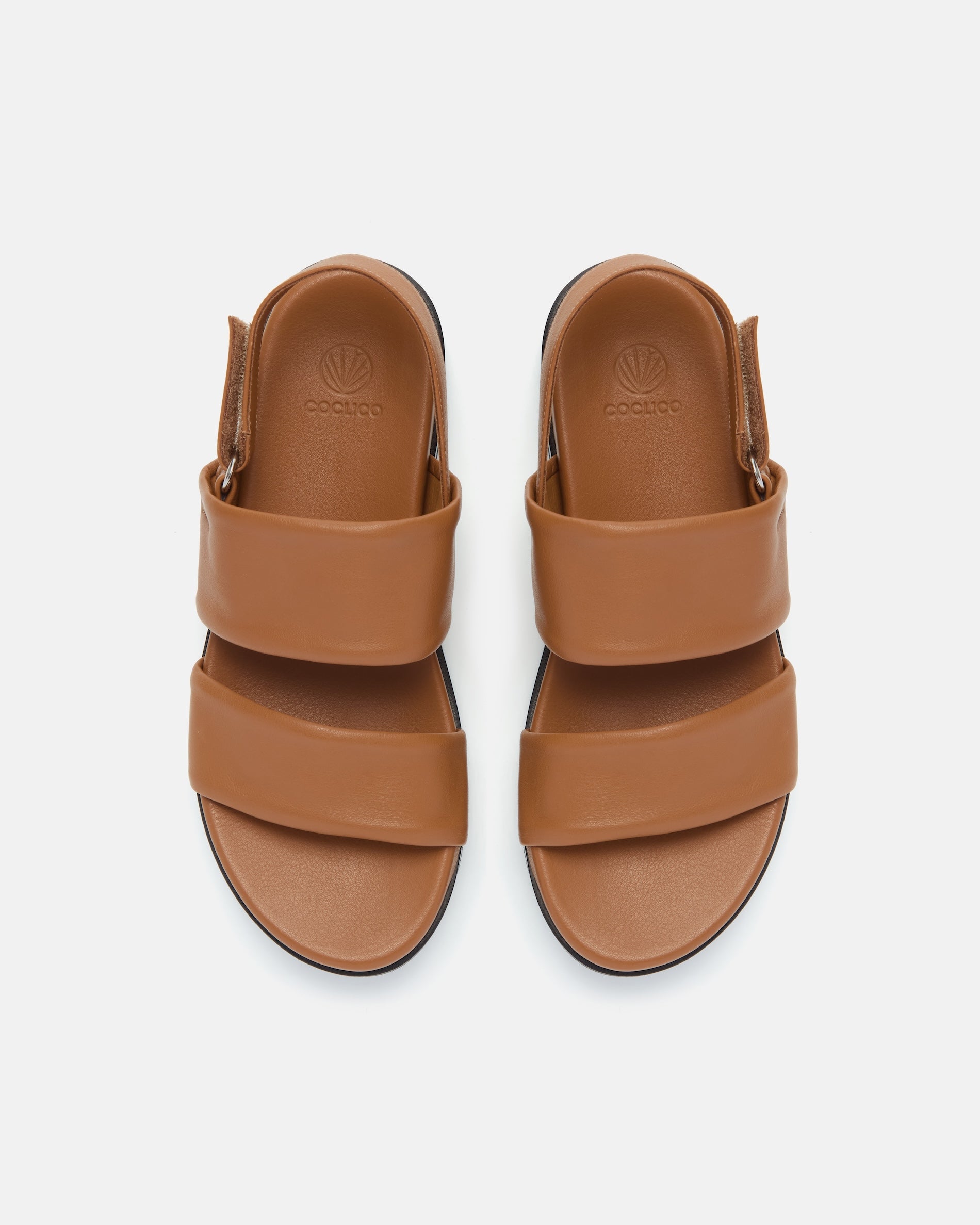 Top view of a brown leather wedge sandal with wide tubular straps, velcro slingback, and a lightweight EVA platform sole