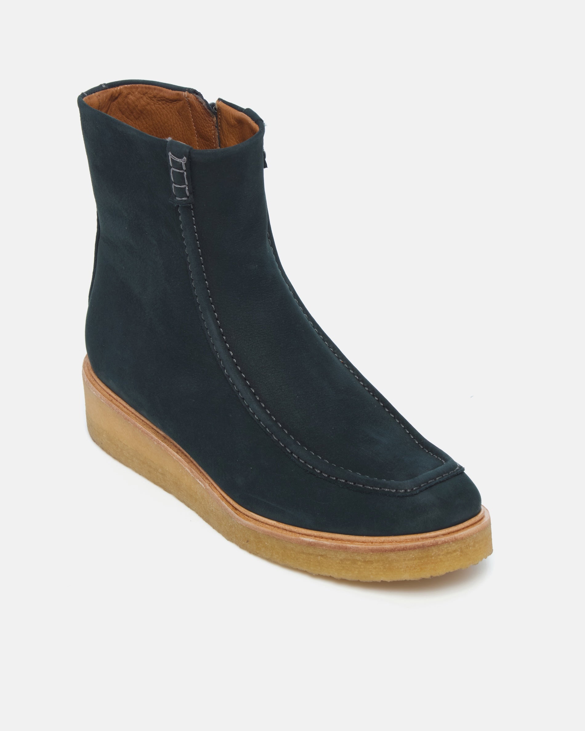 Coclico Haber Boot in Deep Sea nubuck, angled view of the front zip and crepe wedge sole