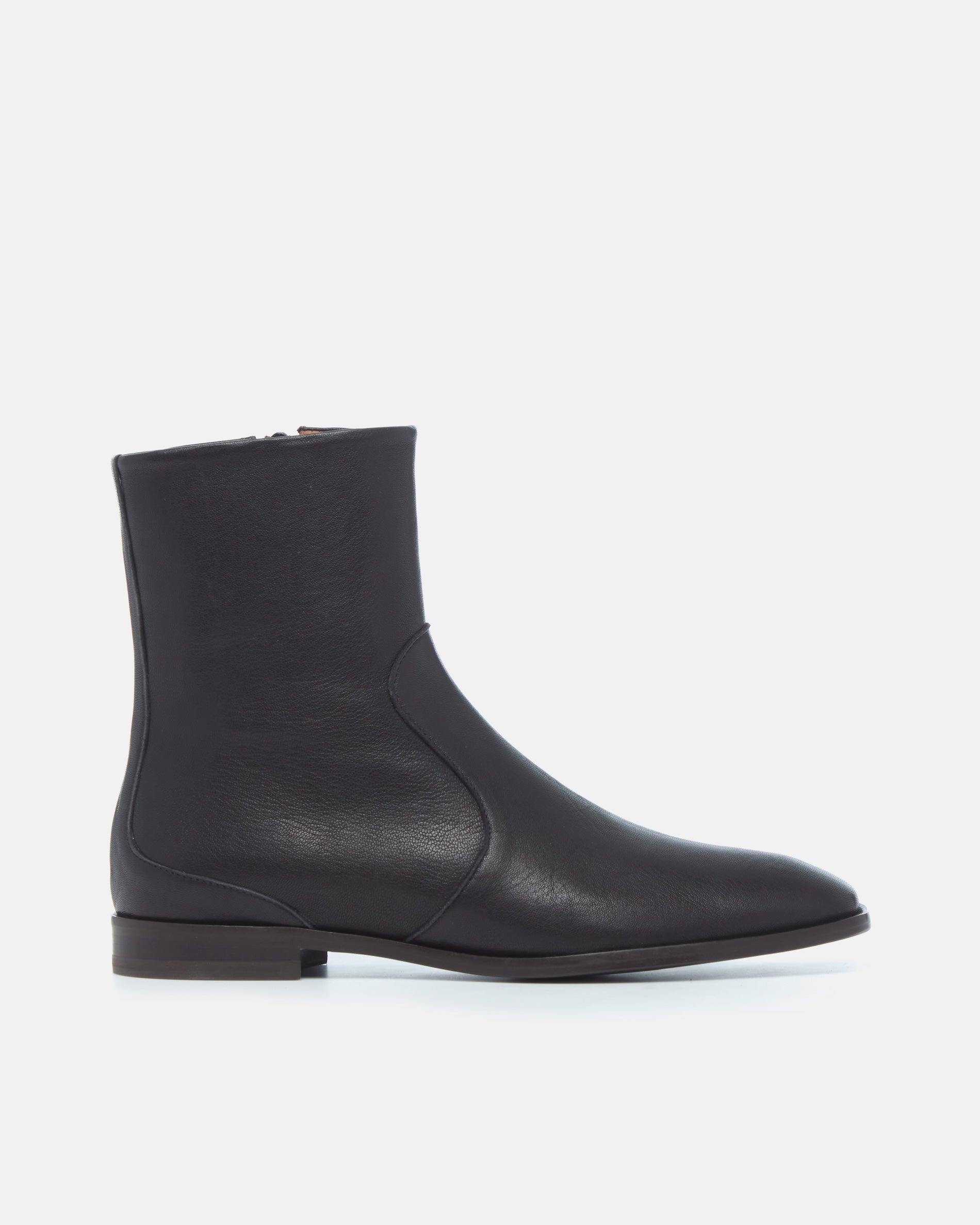 Coclico Hopper Boot in black leather, side view of a flat square toe ankle boot with side zip