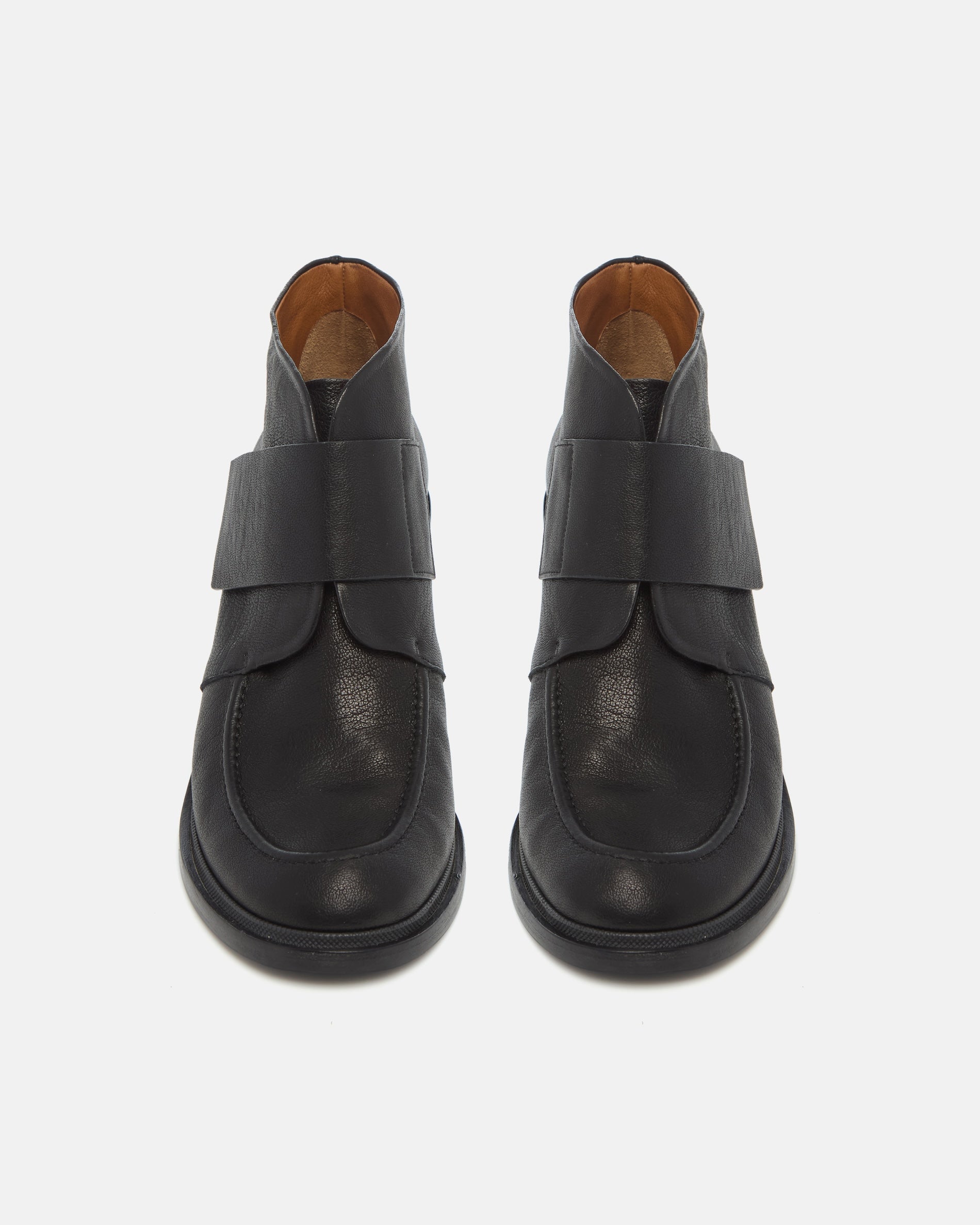 Pair of Coclico Lilya Boots in black leather, top view showing strap detail