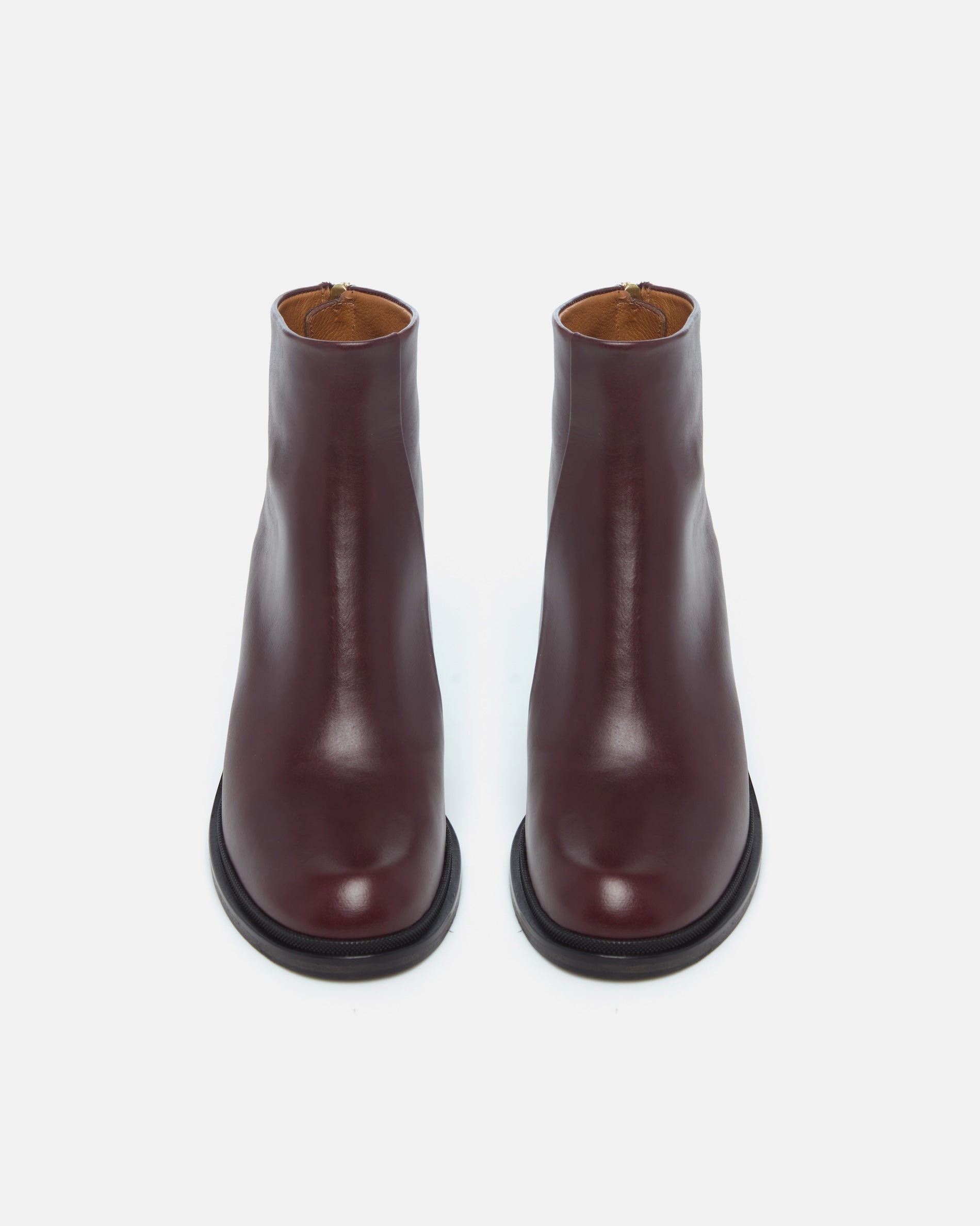 Pair of Coclico Lola Boots in Oxblood leather, front view of block heel ankle boots